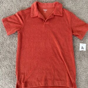 Boys polo, burnt orange, textured polo. Size medium, new with tags